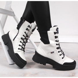 Stivali da donna in pelle bianca impermeabile Rieker Revolution W0374-80 bianco nero 1