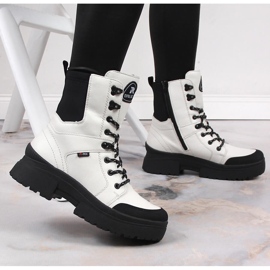 Stivali da donna in pelle bianca impermeabile Rieker Revolution W0374-80 bianco nero 2