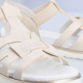 Rieker V5052-80 comodi sandali slip-on da donna con elastico beige 1