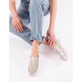 Scarpe traforate in pelle da donna sulla piattaforma dorata Shelovet d'oro 1