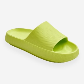 Pantofole leggere alla moda su una suola massiccia ribelle color lime verde 1