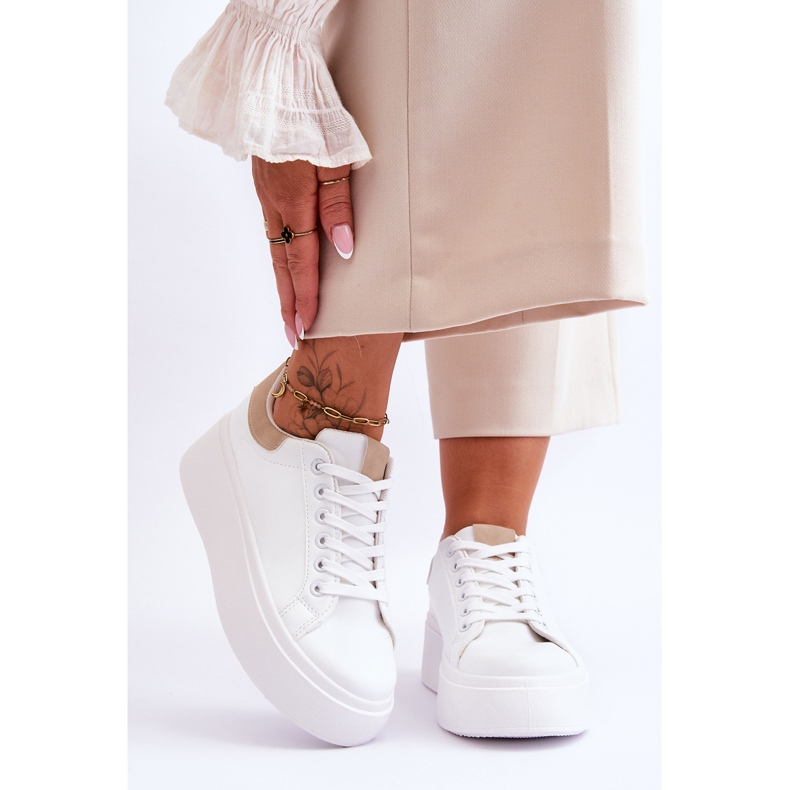 Scarpe sportive su una massiccia piattaforma bianca e beige Boneti 1